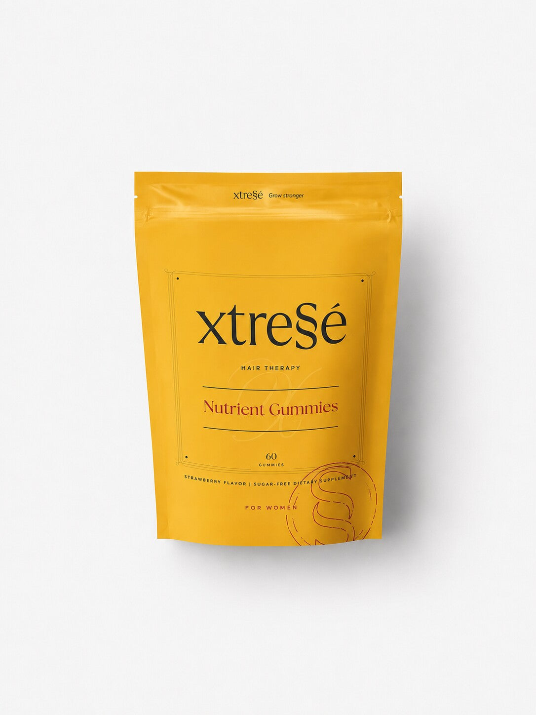 Xtresse Hair Therapy Nutrient Gummies for women in a yellow strawberry-flavor pouch, 60 count.