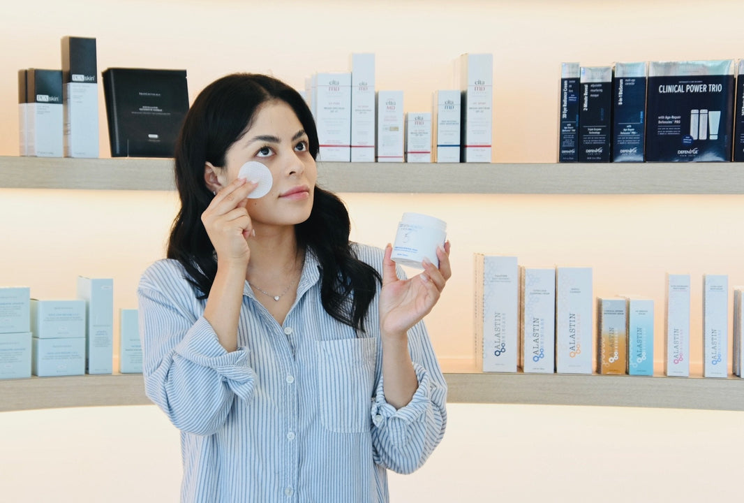 Customer exploring sunscreen options at L&P Skin Shop
