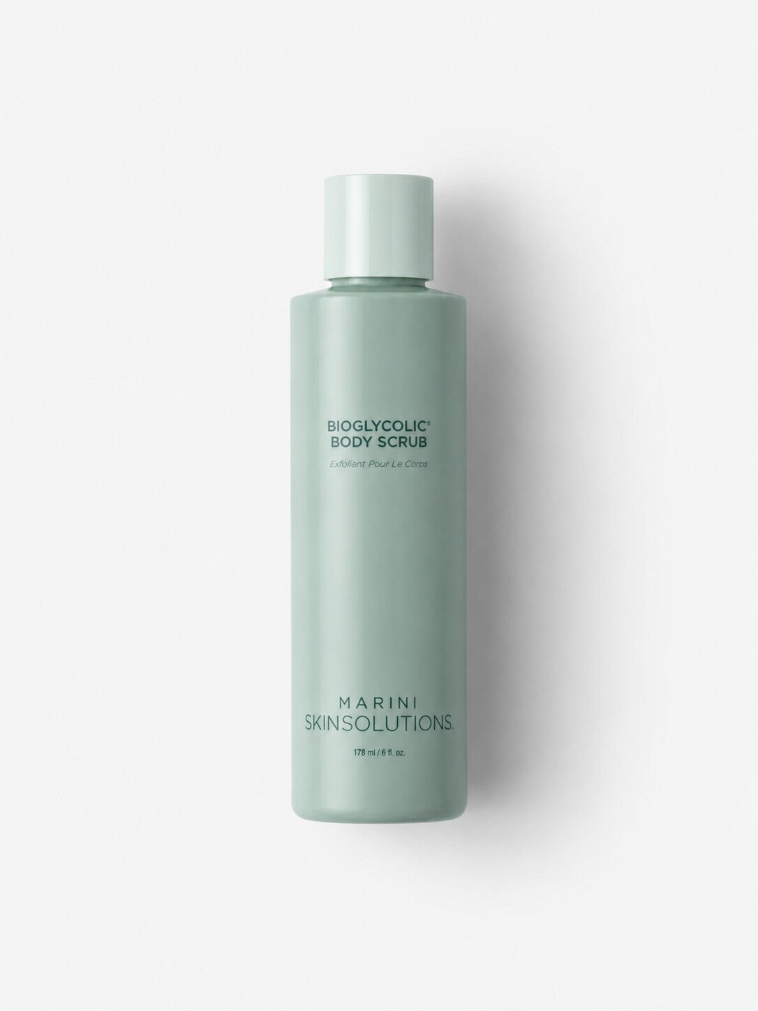 Jan Marini Bioglycolic Body Scrub exfoliating body scrub in a sage green bottle.