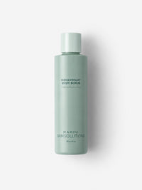 Jan Marini Bioglycolic Body Scrub exfoliating body scrub in a sage green bottle.