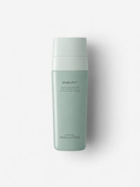 Jan Marini Duality benzoyl peroxide acne and anti-aging treatment in a sage green airless bottle.