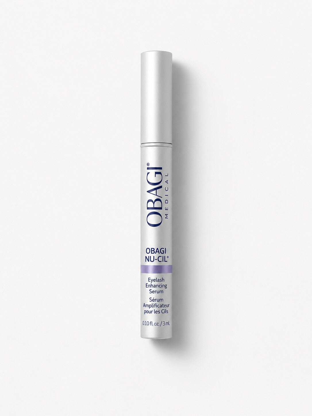 Obagi Nu-Cil Eyelash Enhancing Serum in a slim silver applicator tube for fuller-looking lashes.