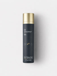 skinbetter science Solo Hydrating Defense antioxidant moisturizer for men in a navy airless bottle with gold cap.